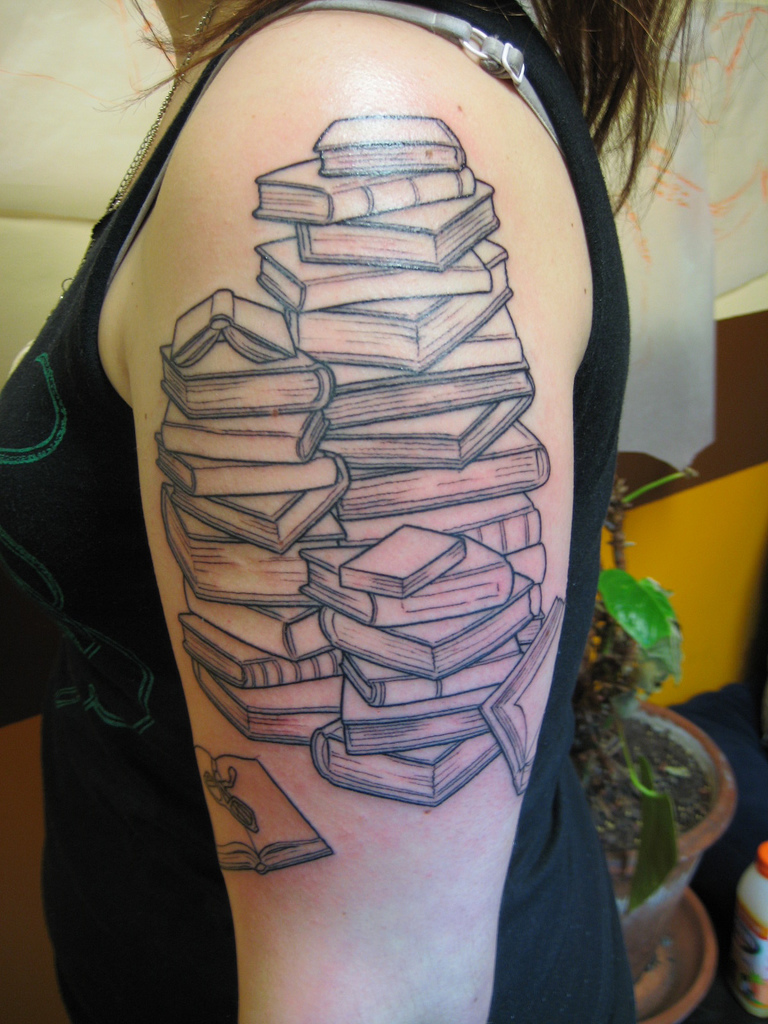 Stack of Books tattoo-photo by S. Archuleta, flickr.