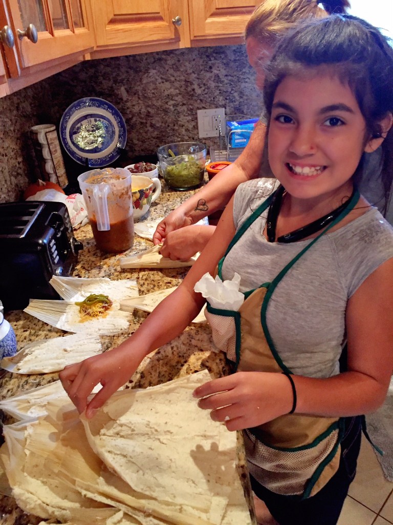 Corn husks with masa ready to be stuffed-www.alvaradofrazier.com